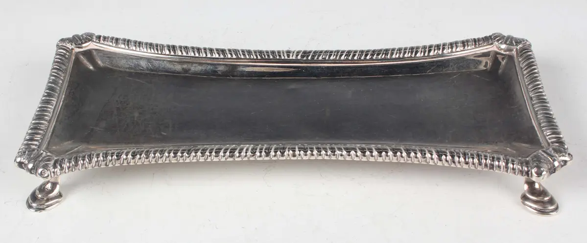 A George III silver snuffer tray of waisted rectangular form with