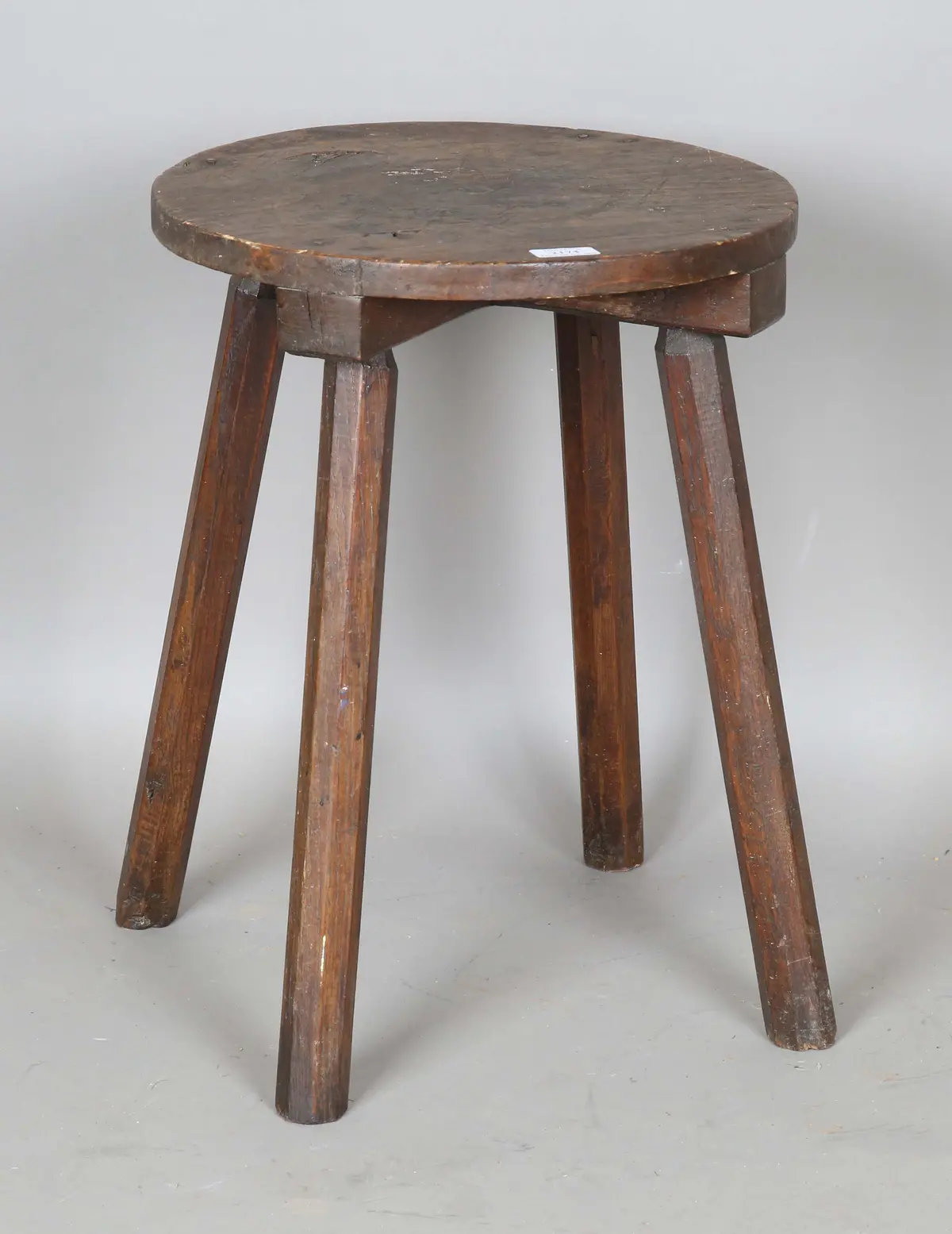 A 19th century provincial ash and softwood circular table with four