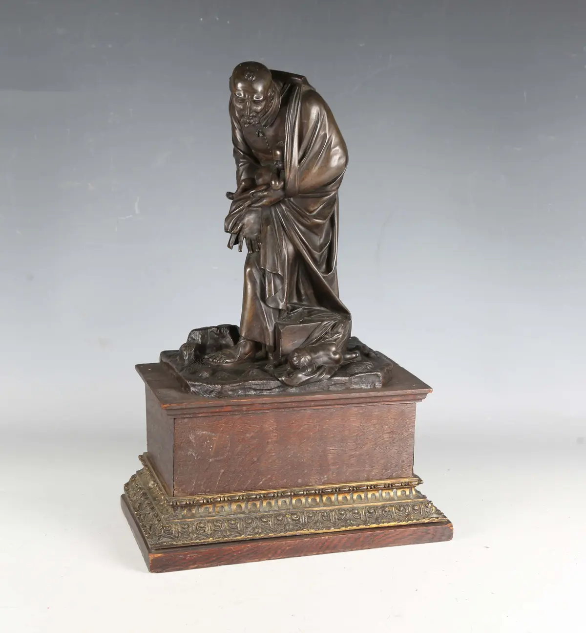 A 19th century Continental brown patinated cast bronze figure of a