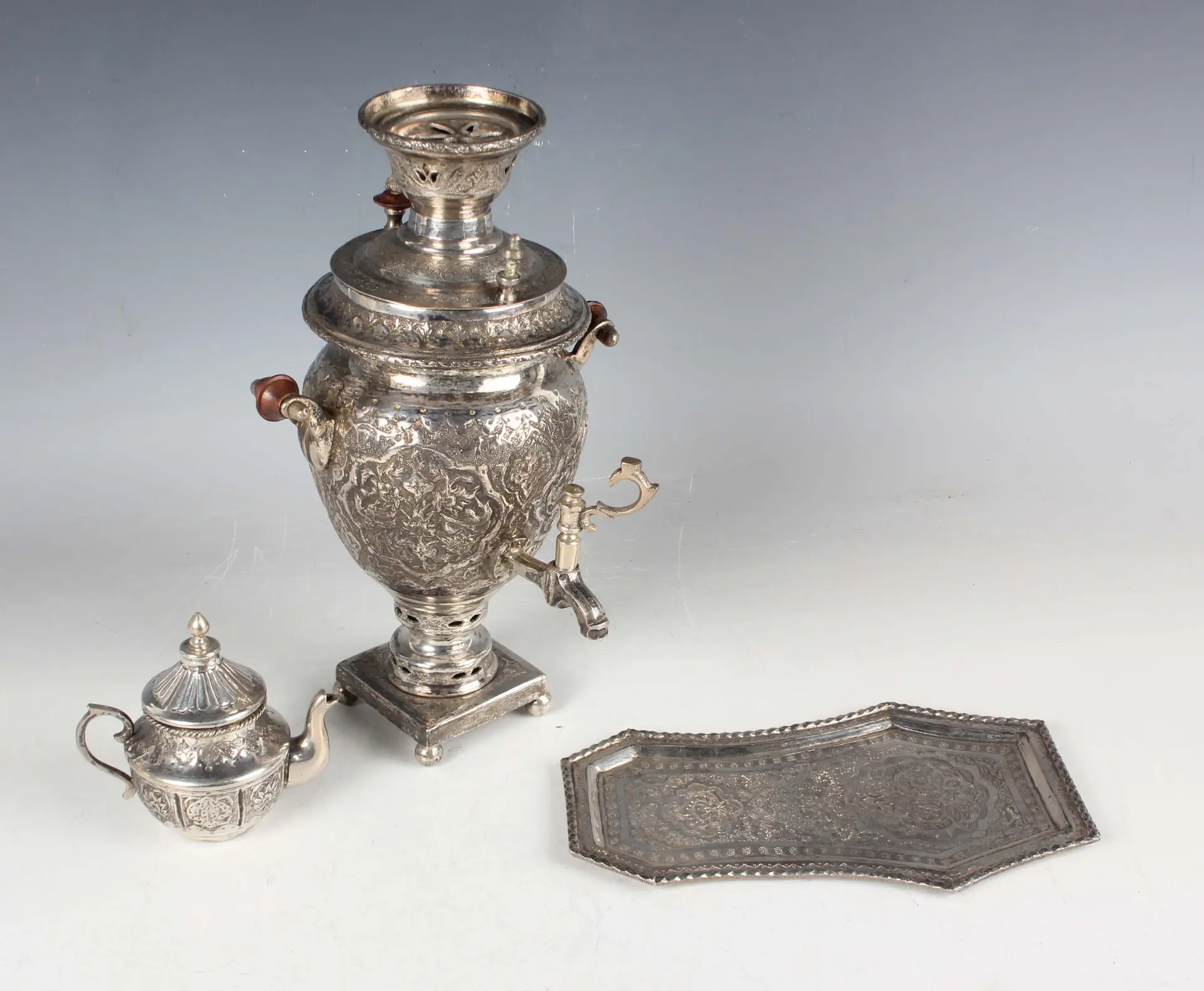 A 20th century Persian silver diminutive three-piece tea service