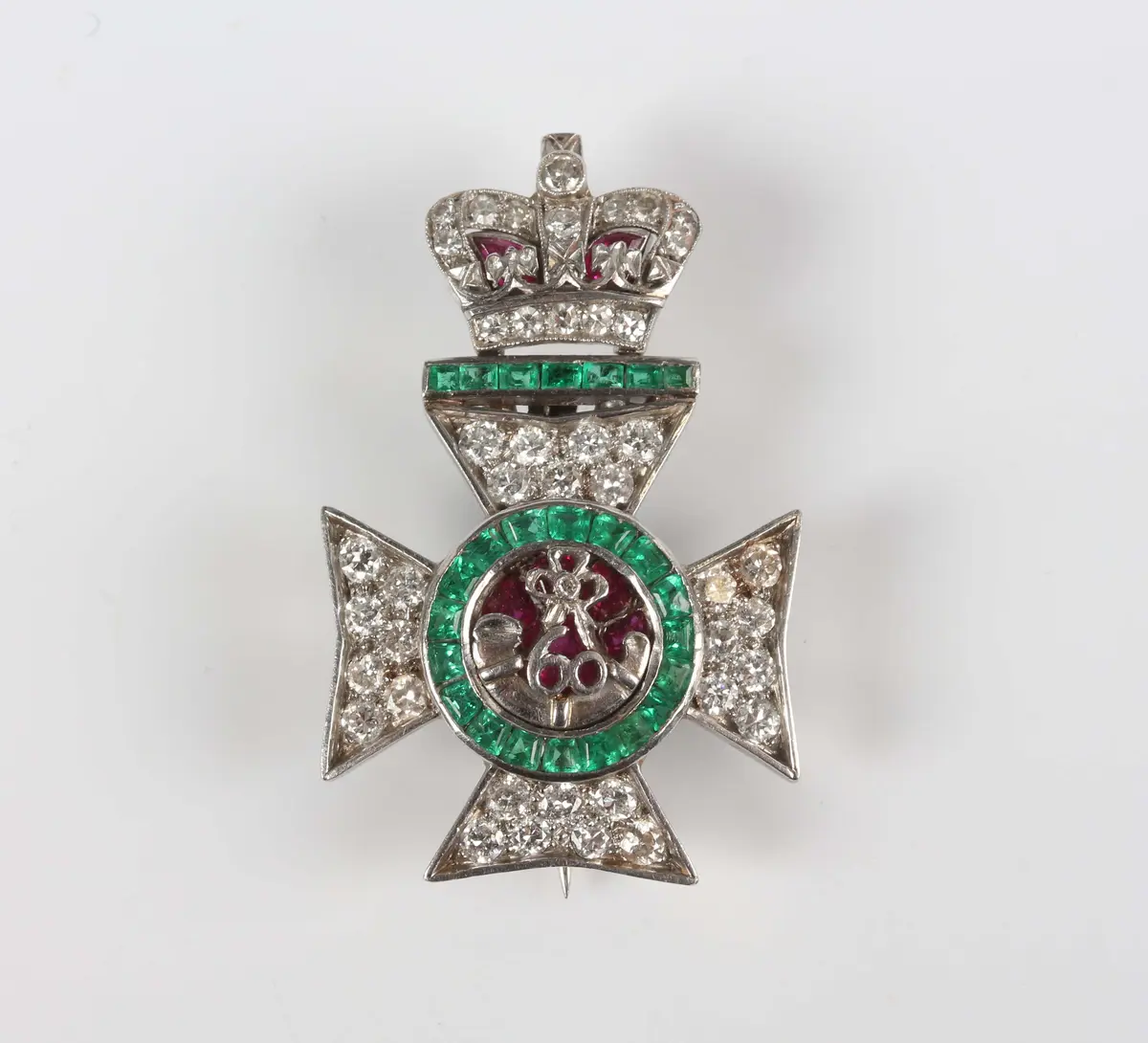 A platinum, emerald, ruby and diamond King's Royal Rifles sweetheart