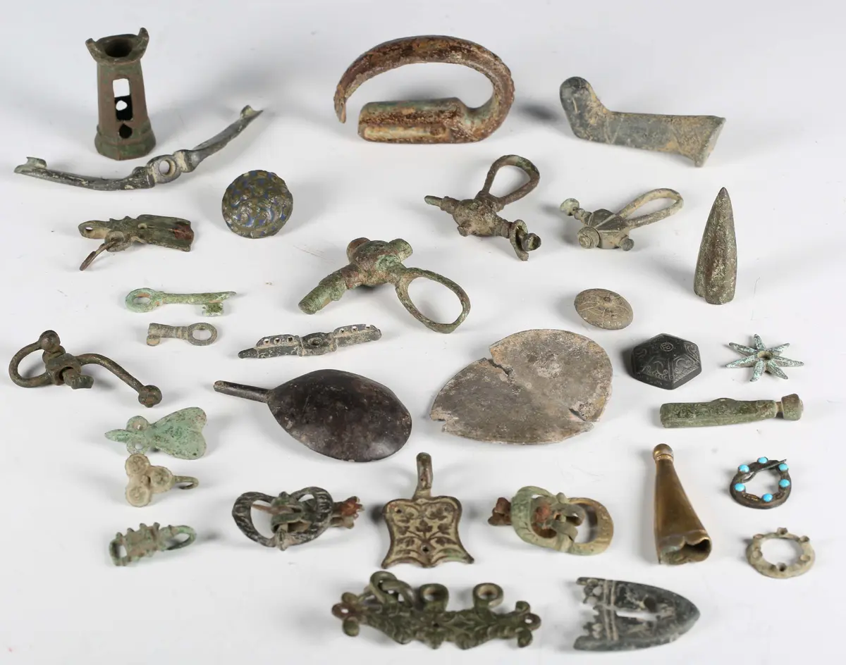 A large collection of medieval and later copper alloy artefacts, including