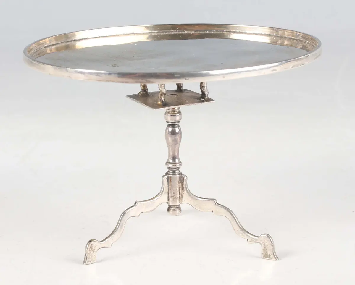 An early 18th century Dutch miniature toy silver oval tilt-top table