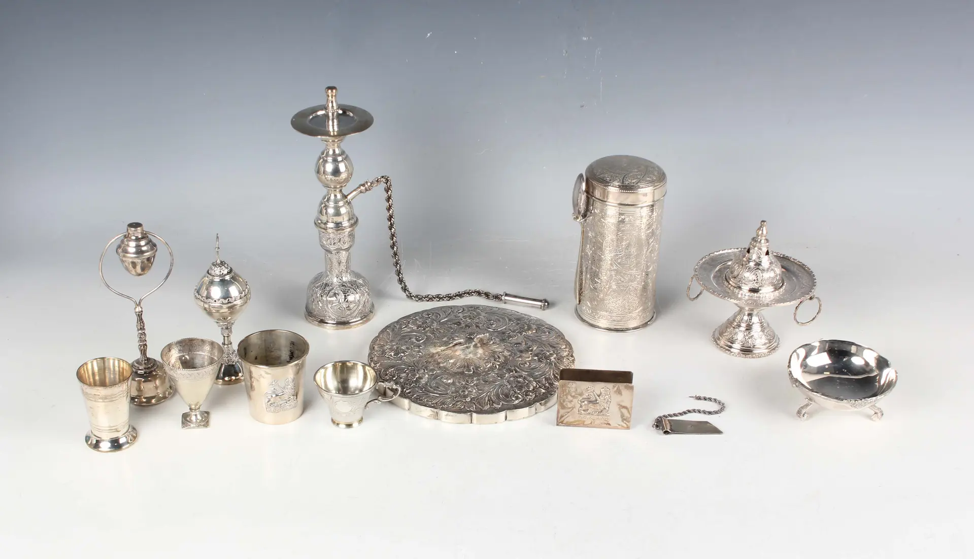 A small collection of Middle Eastern silver and plated items, including