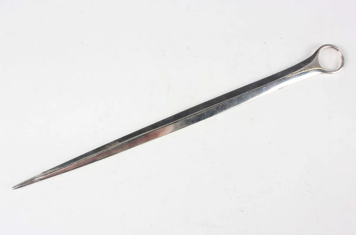 A George III silver meat skewer with ring terminal, monogram engraved
