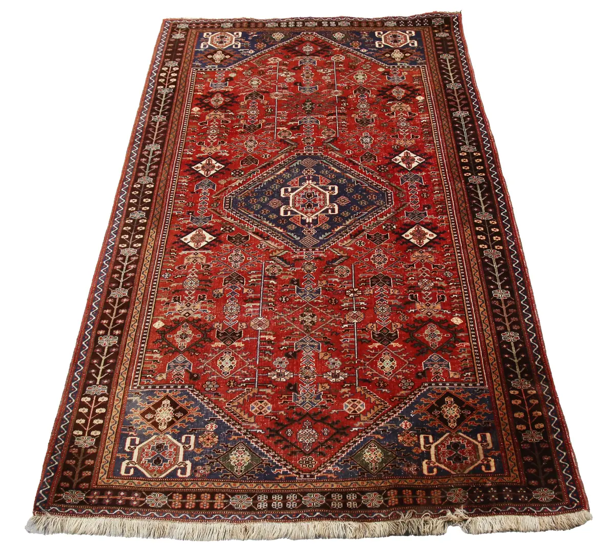 A South-west Persian rug, early 20th century, the red field with an