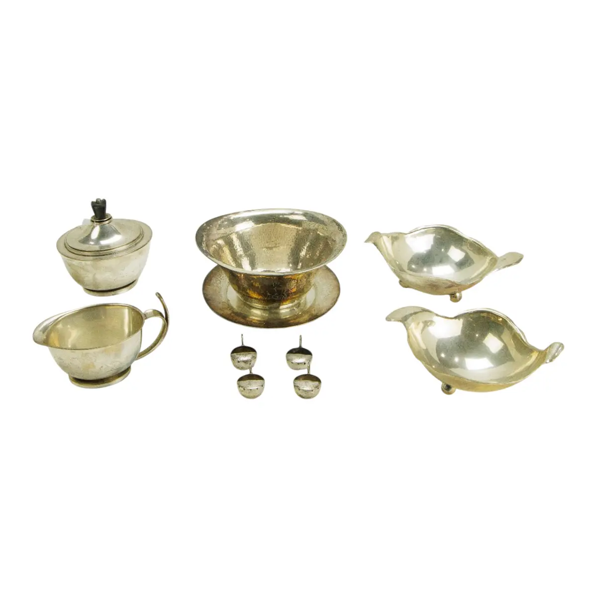 A group of hand wrought silver items