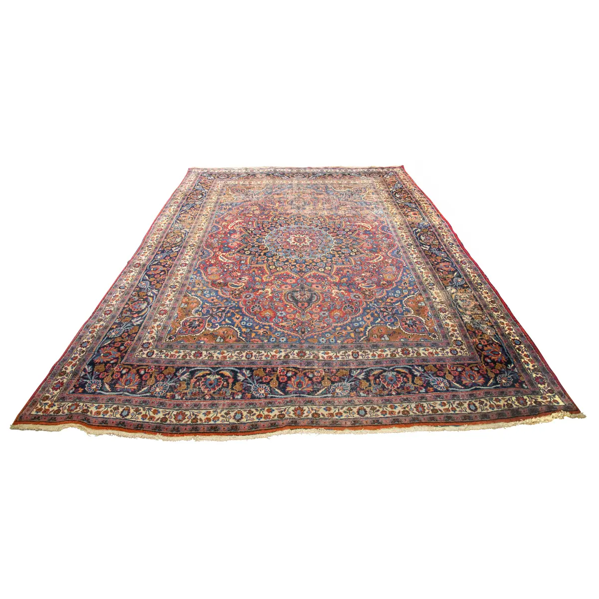 An antique Persian Mashad carpet