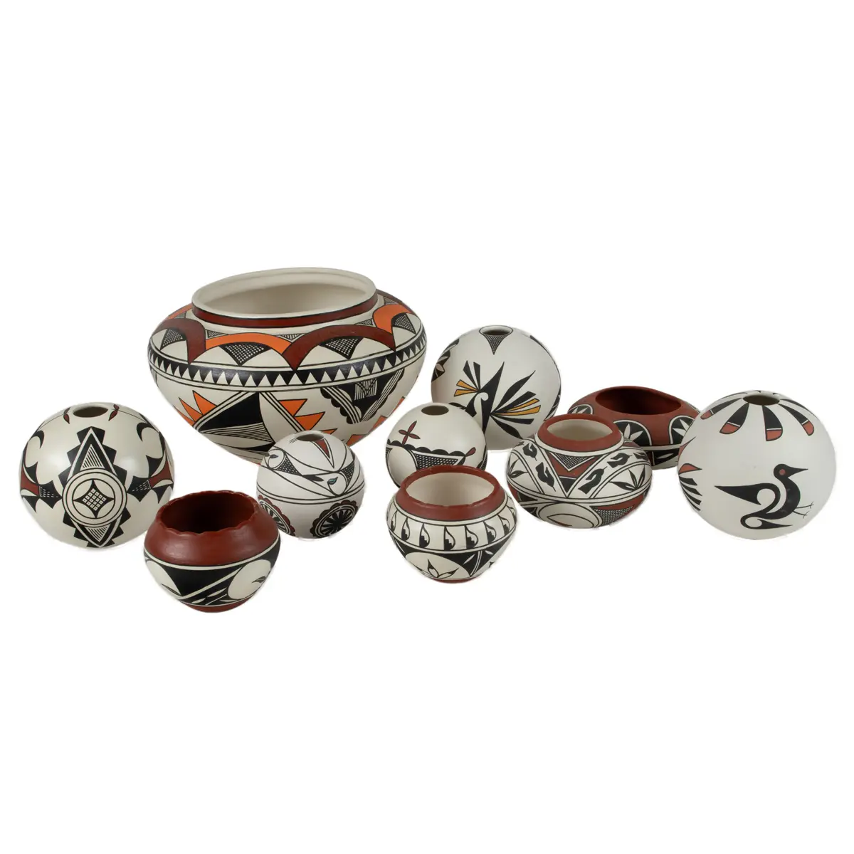 A collection of ten Ol Bald Eagle N.D. Marshall Native American pottery vessels