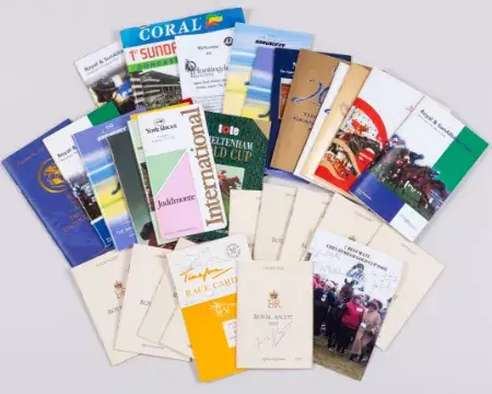 Racecards including autographed examples