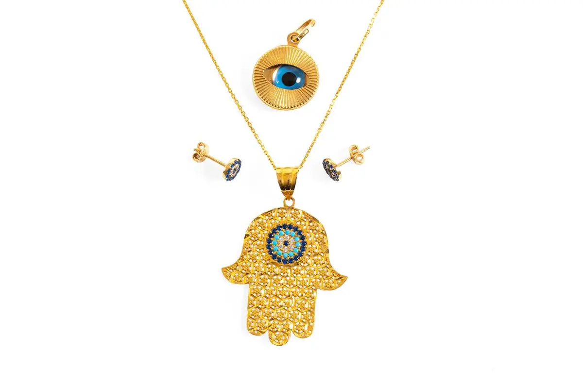 A Hand of Fatima Pendant on Chain, An Evil Eye Pendant, A Pair of