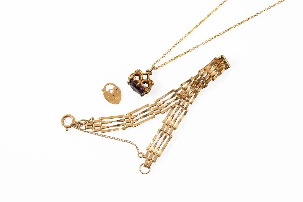 A 9 Carat Gold Gate Link Bracelet, A Purple Stone Pendant on Chain