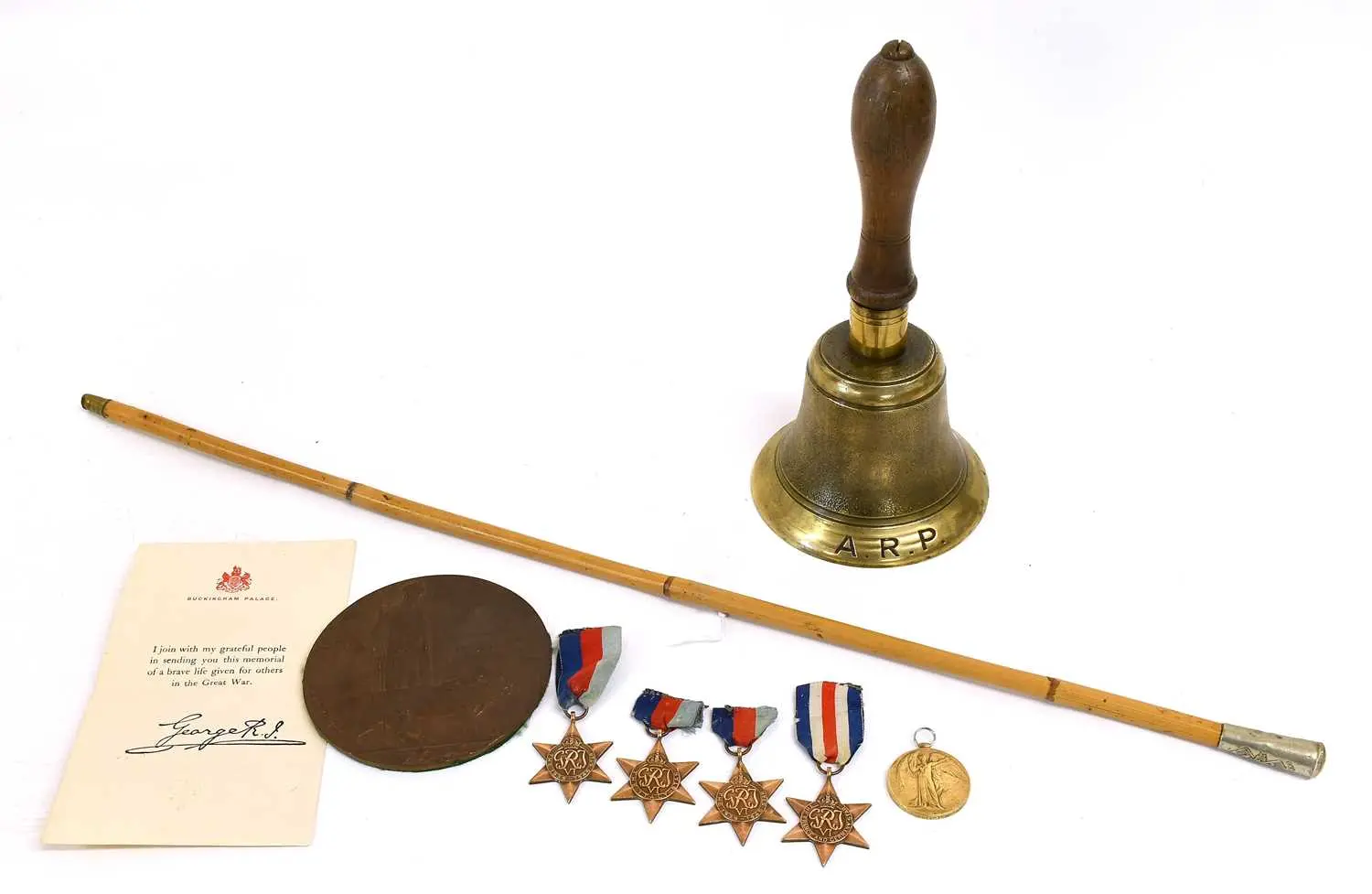A Memorial Plaque, a Victory Medal, four Second World War Medals