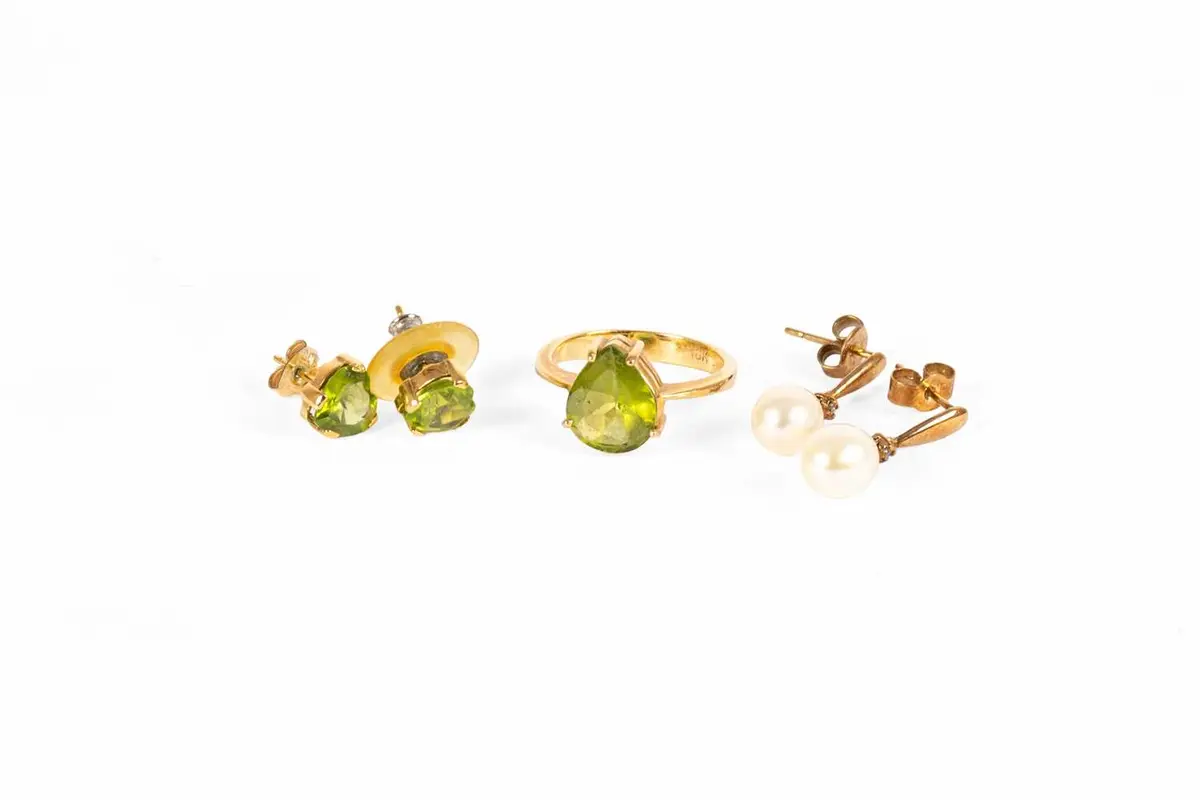 A Peridot Ring, A Pair of Peridot Earrings, A Pair of Cultured Pearl