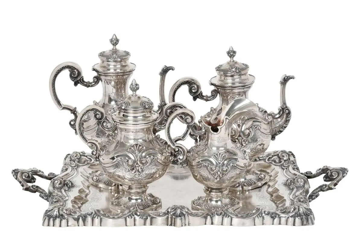 A Four-Piece Portuguese Silver Tea and Coffee-Service With a Tray