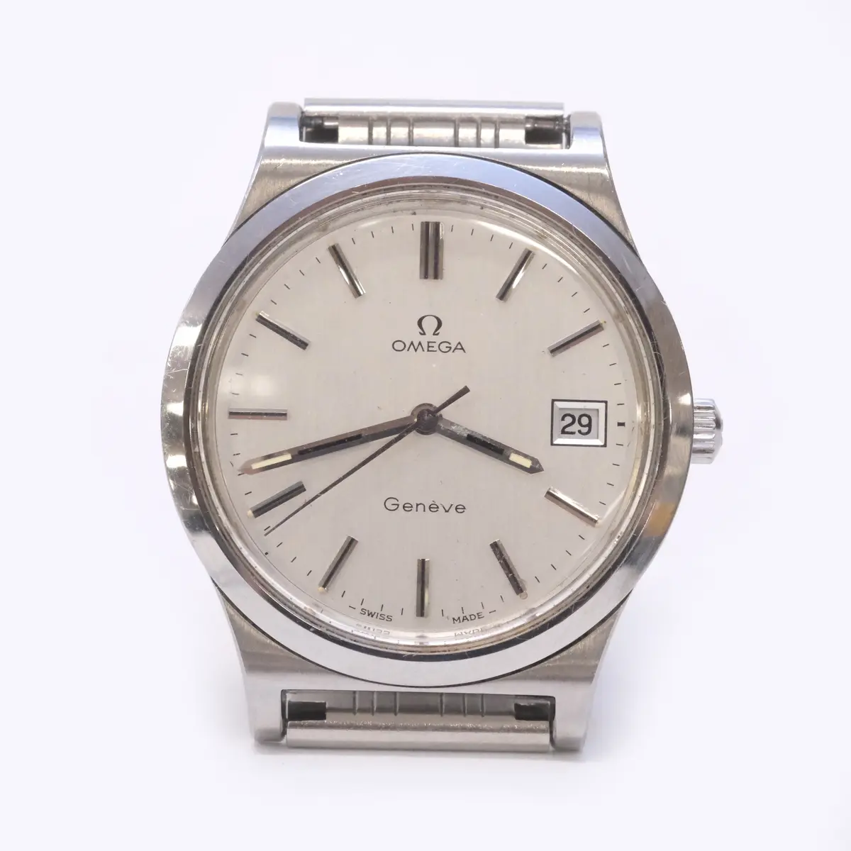 OMEGA. ARMBANDSUR. GENÉVE. STÅLBOETT. ÅR 1974.