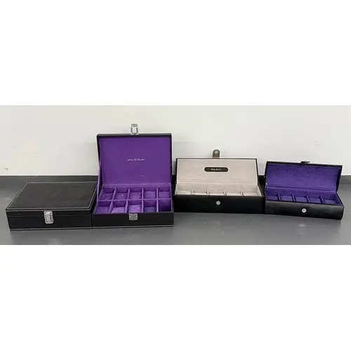 Two Aston of London black ten compartment watch storage case...