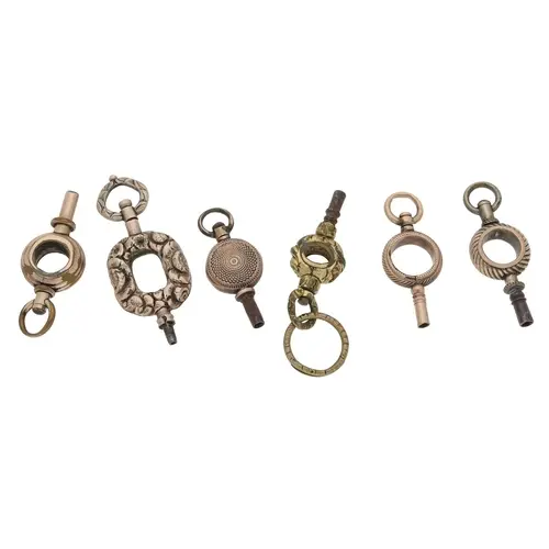 Six assorted pocket watch keys (6)