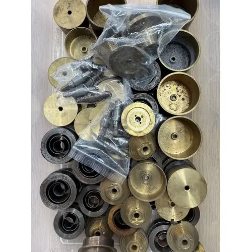 Assorted mainsprings, barrels and fusee cones...