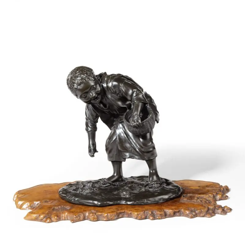 19th Century Meiji Period Bronze of a Boy Collecting Sweet Chestnuts by Seiya