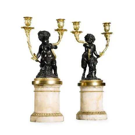 A pair of 19th century bronze, ormolu and fluorspar candelabra