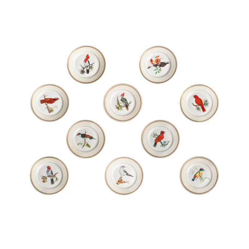 A set of 10 hand painted porcelain Vista Alegre dessert plates