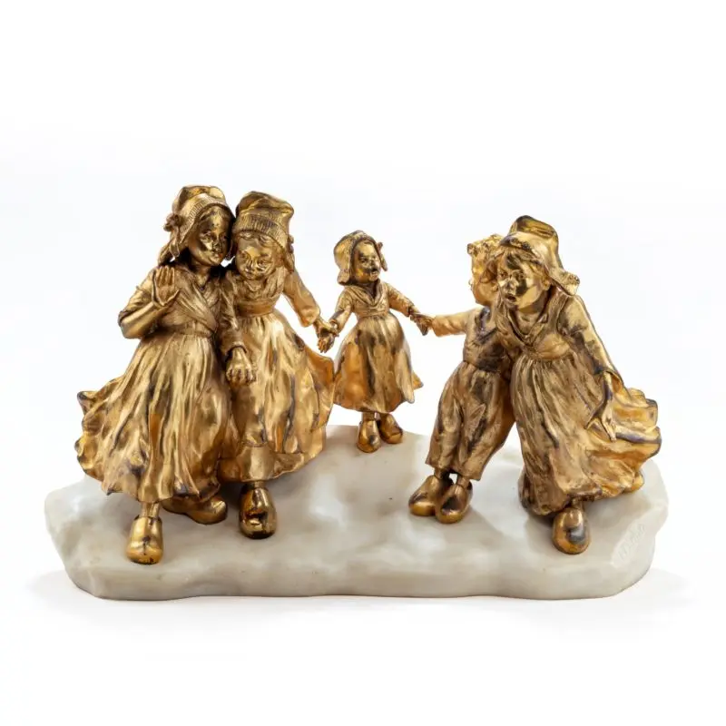 A charming gilt bronze group of Dutch children by Guiseppe or Joseph