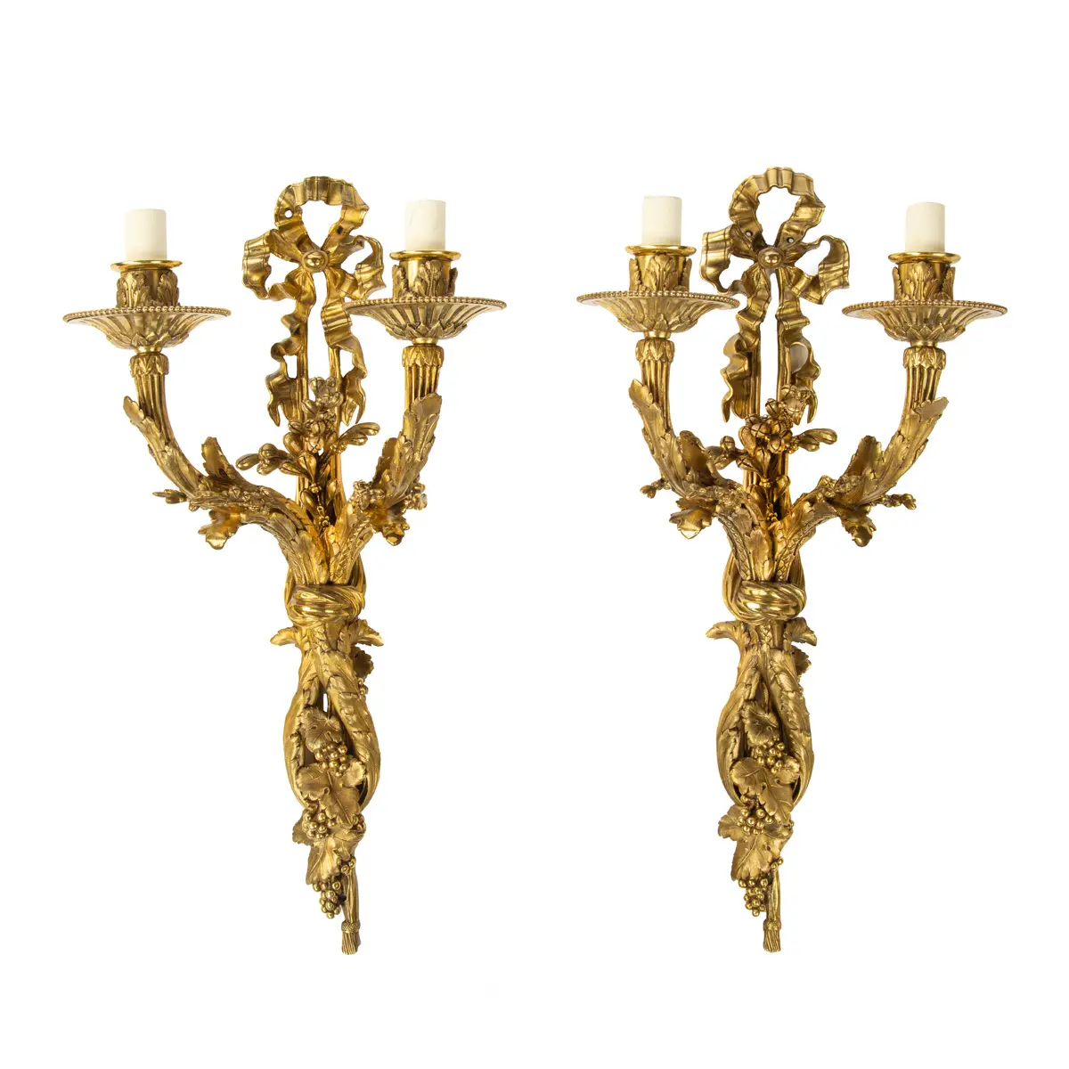 A pair of Napoleon III two-branch ormolu wall lights