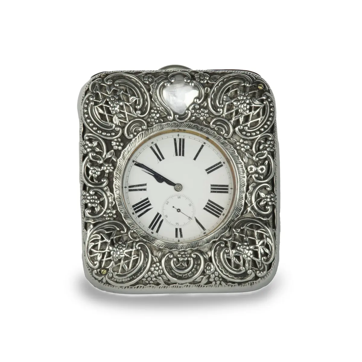 An Edwardian silver watch set into a repousse silver case