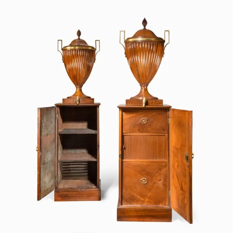 A fine pair of George III mahogany wine cisterns attributed to Gillows