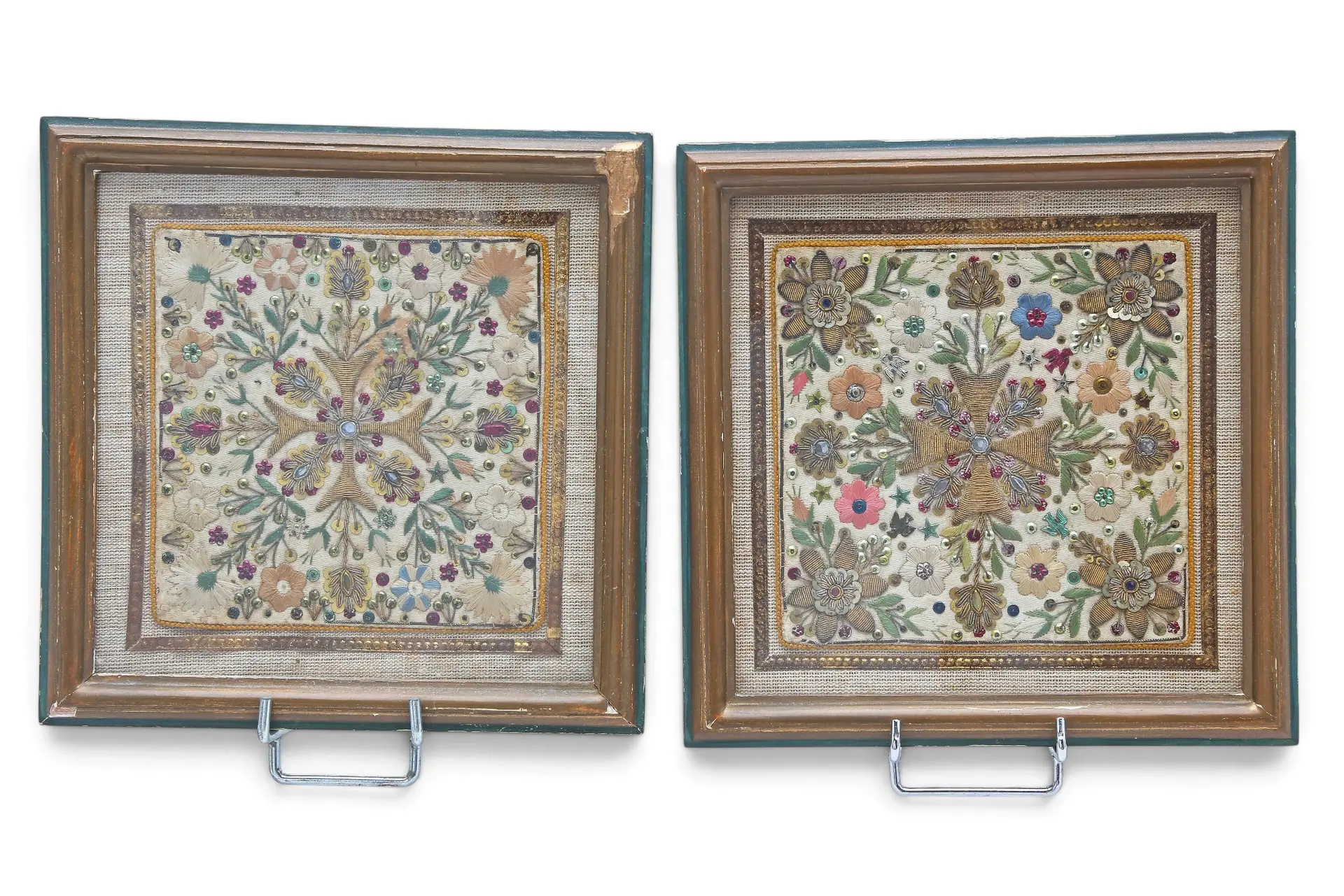 Pair of floral panels in embroidered silk, 19th Century.