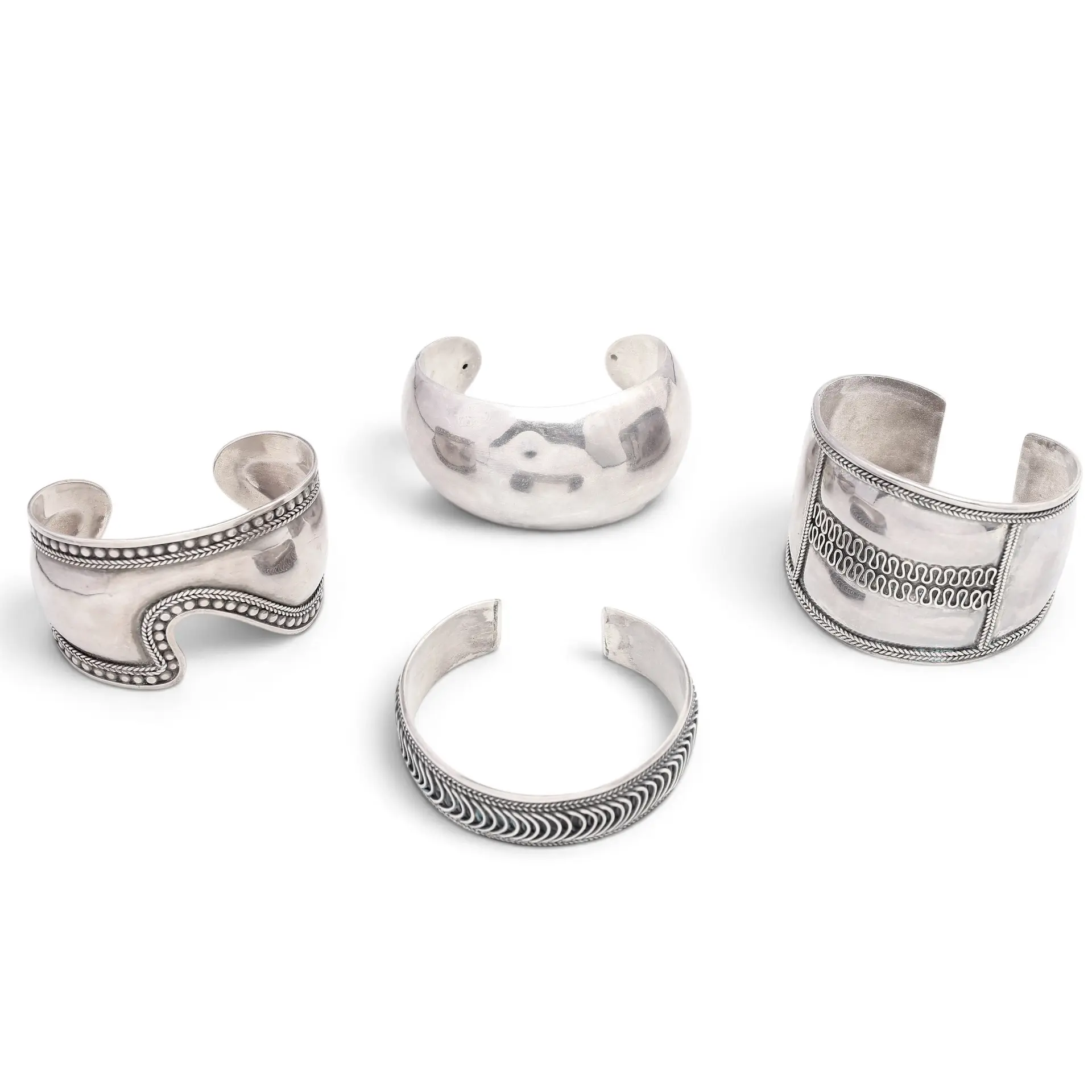 Four silver bangle barcelets.