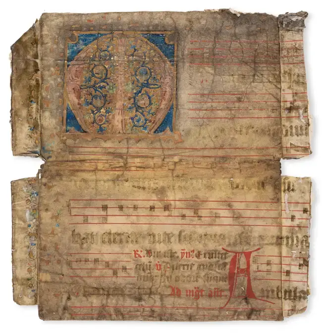 Cutting from an early choirbook, with a large illuminated initial