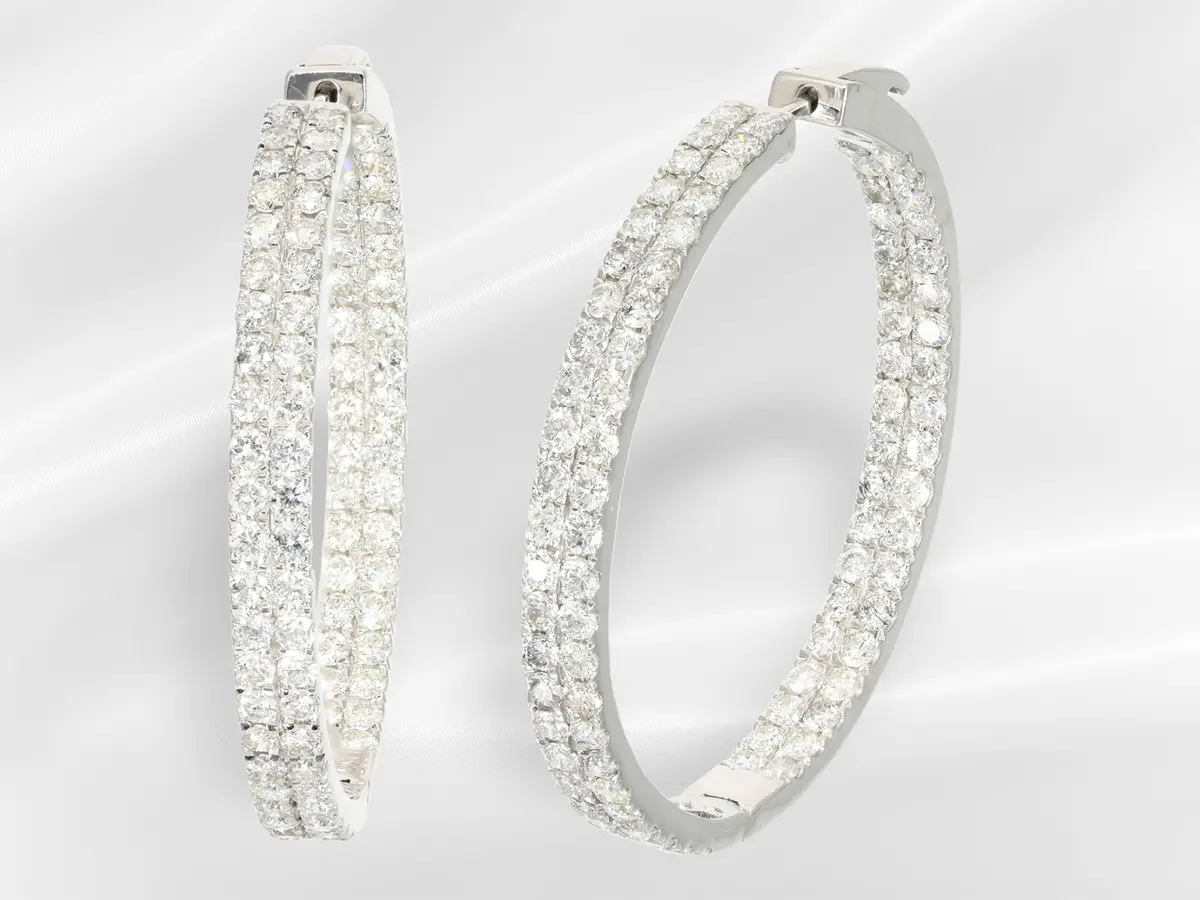 Earrings: modern, large and very decorative hoop earrings with elaborate