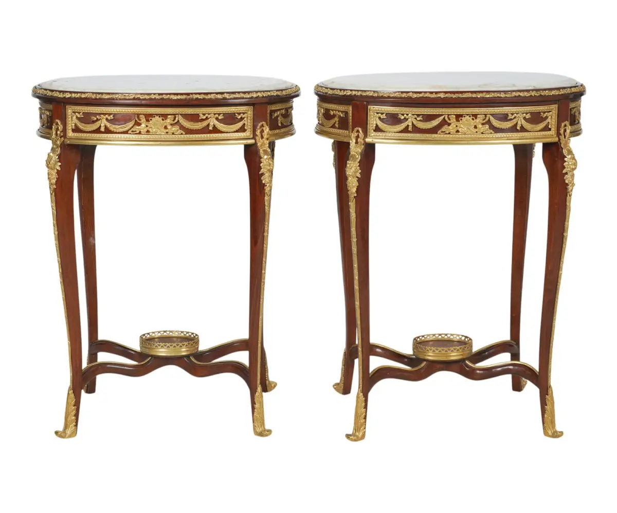 A Pair of French Louis XVI-Style Gilt Bronze Mounted Marble Top Tables