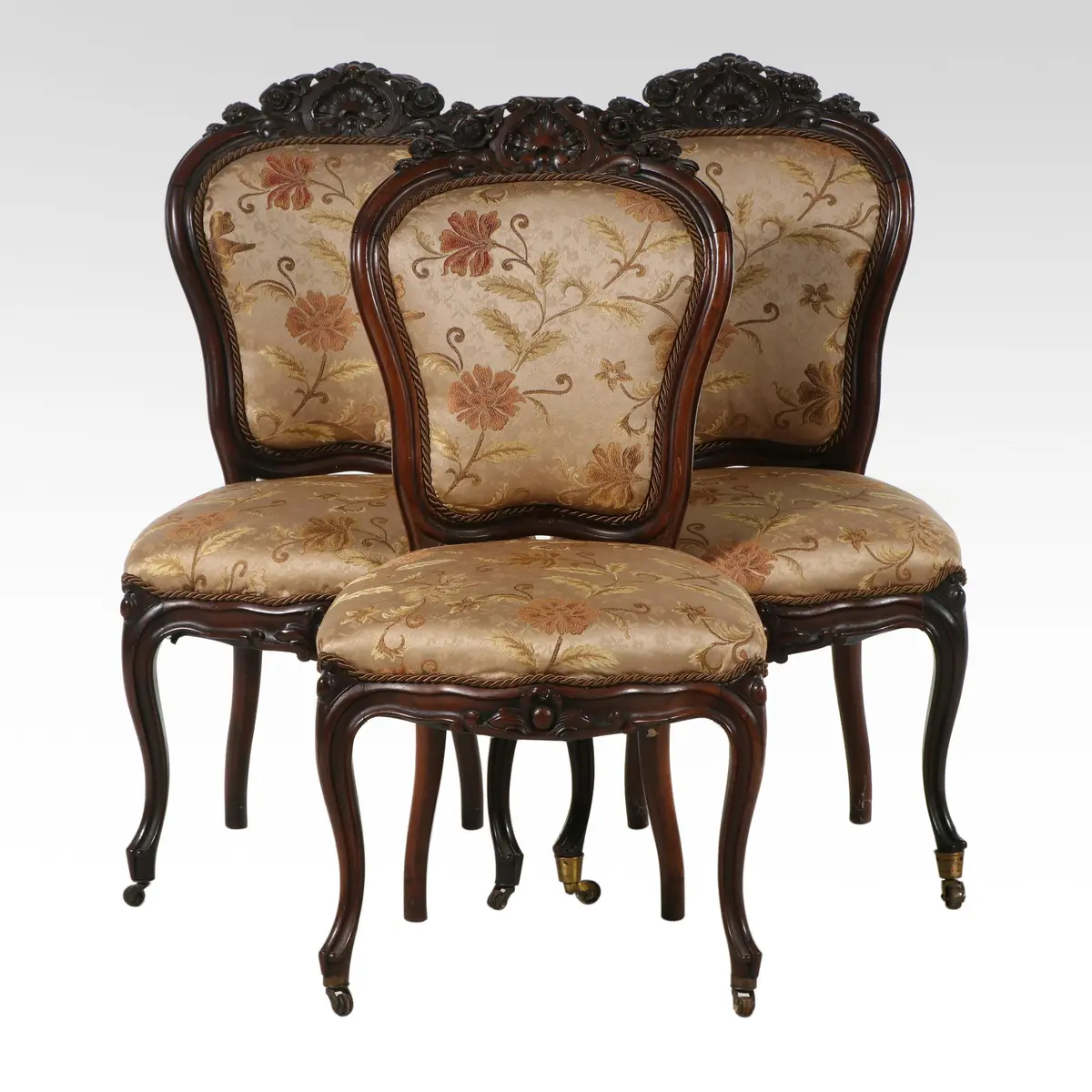 Three Victorian Rococo Revival Carved Rosewood Parlor Chairs