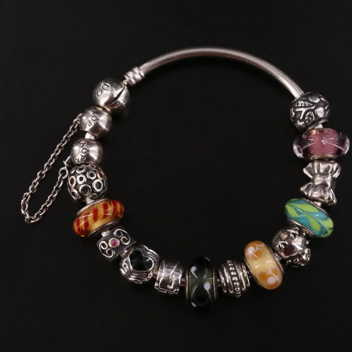 Pandora Sterling Bracelet with Glass, Enamel, and Ruby Bead Charms