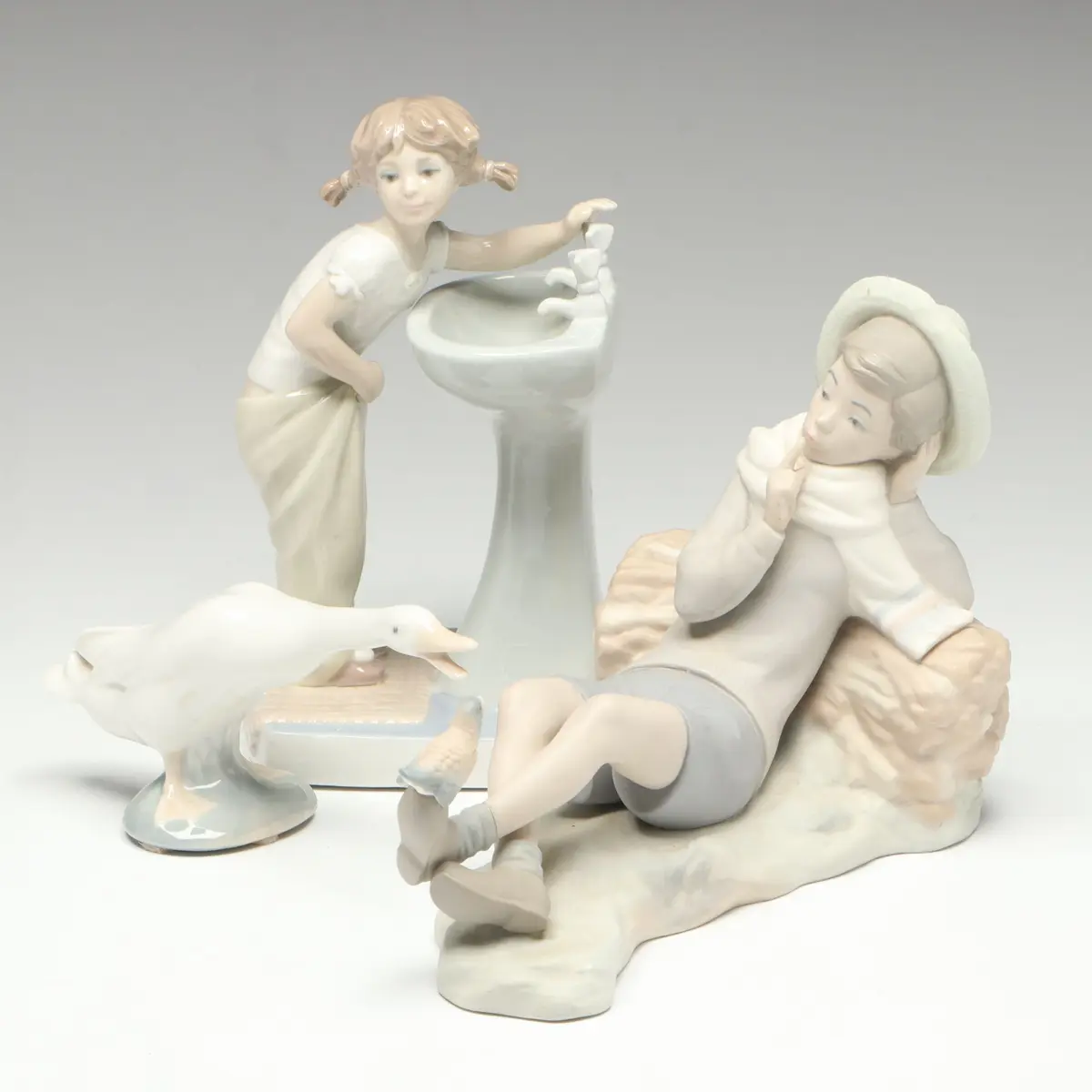 Lladró "Shepherd with Bird," "Clean Up Time" and Other Porcelain Figurine