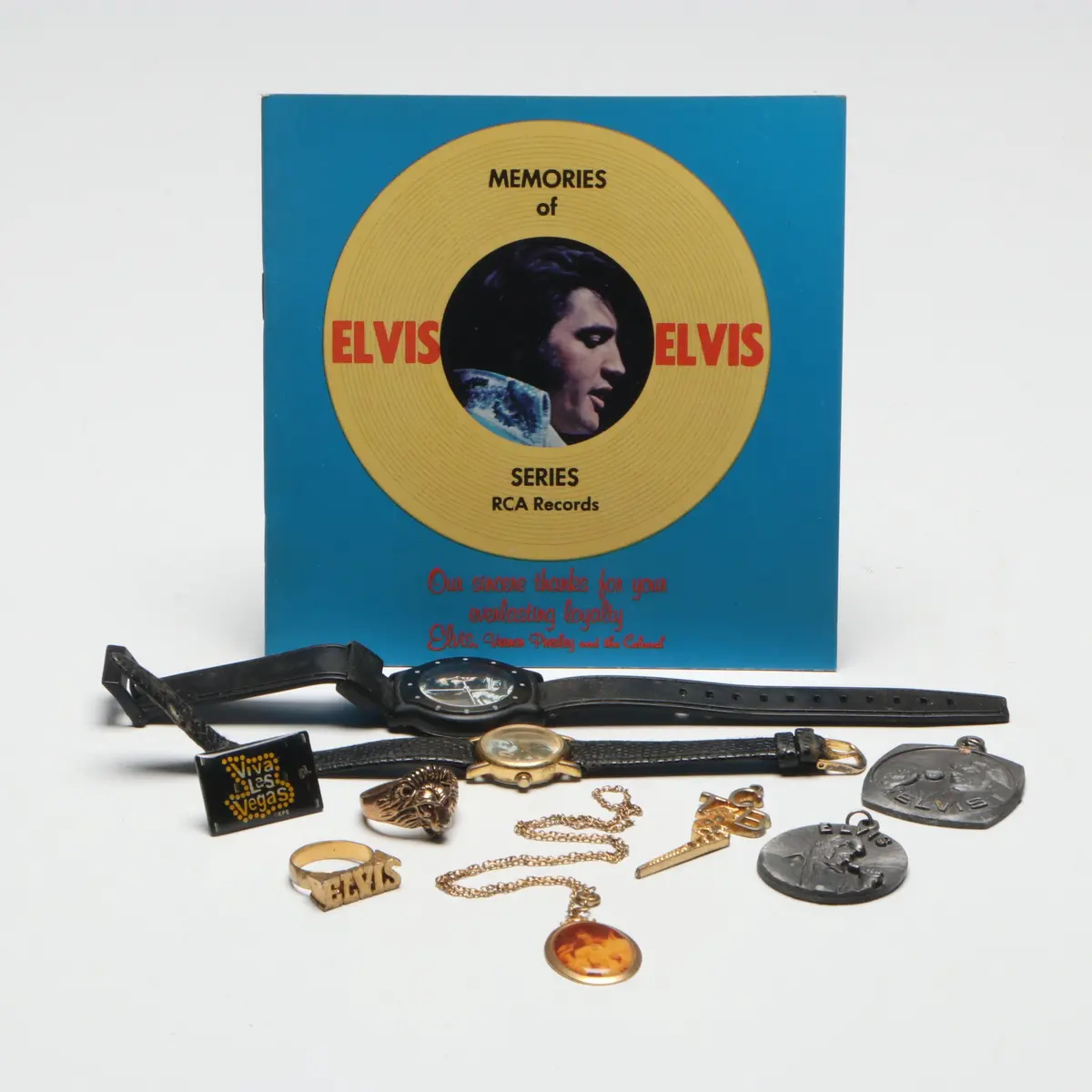 Elvis Presley Gold Plate Rings with Watches, Pendants and More Memorabilia