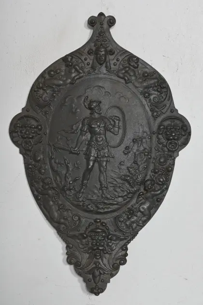 Väggsköld, gjutjärn