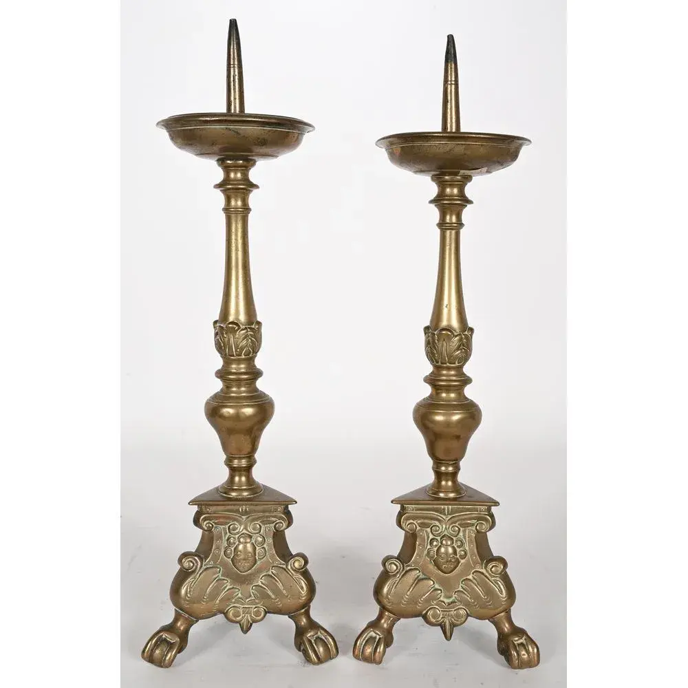 LARGE PAIR OF LOUIS XIII CANDLESTICKS in patinated bronze with a tripod
