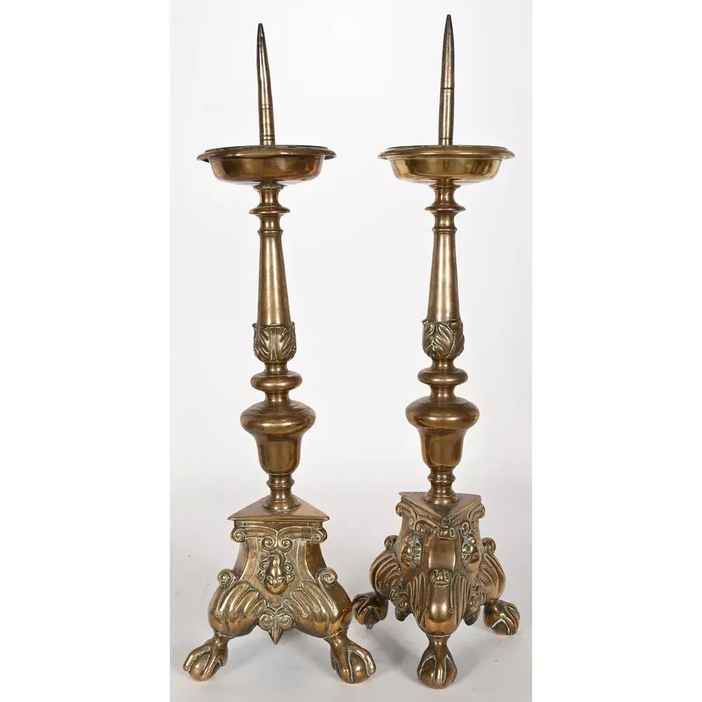 LARGE PAIR OF LOUIS XIII CANDLESTICKS in patinated bronze with a tripod