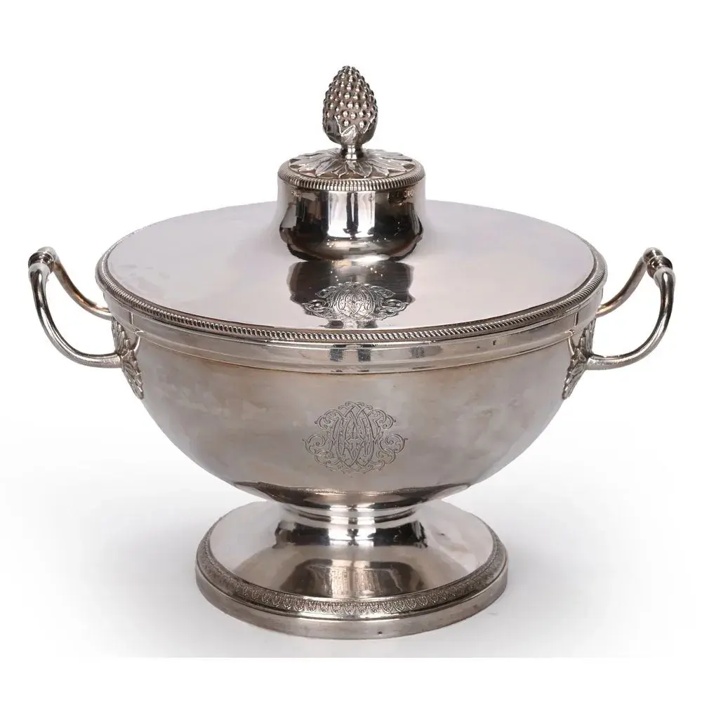 Round 18th-century solid silver soup tureen resting on a pedestal