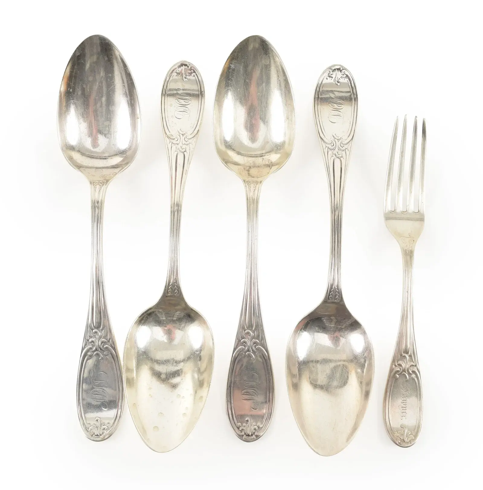 5 Pieces of 19th Century American silver flatware including 4 tablespoons