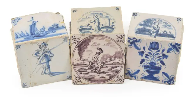 A collection of 25 18th and 19th Century faience tiles in various