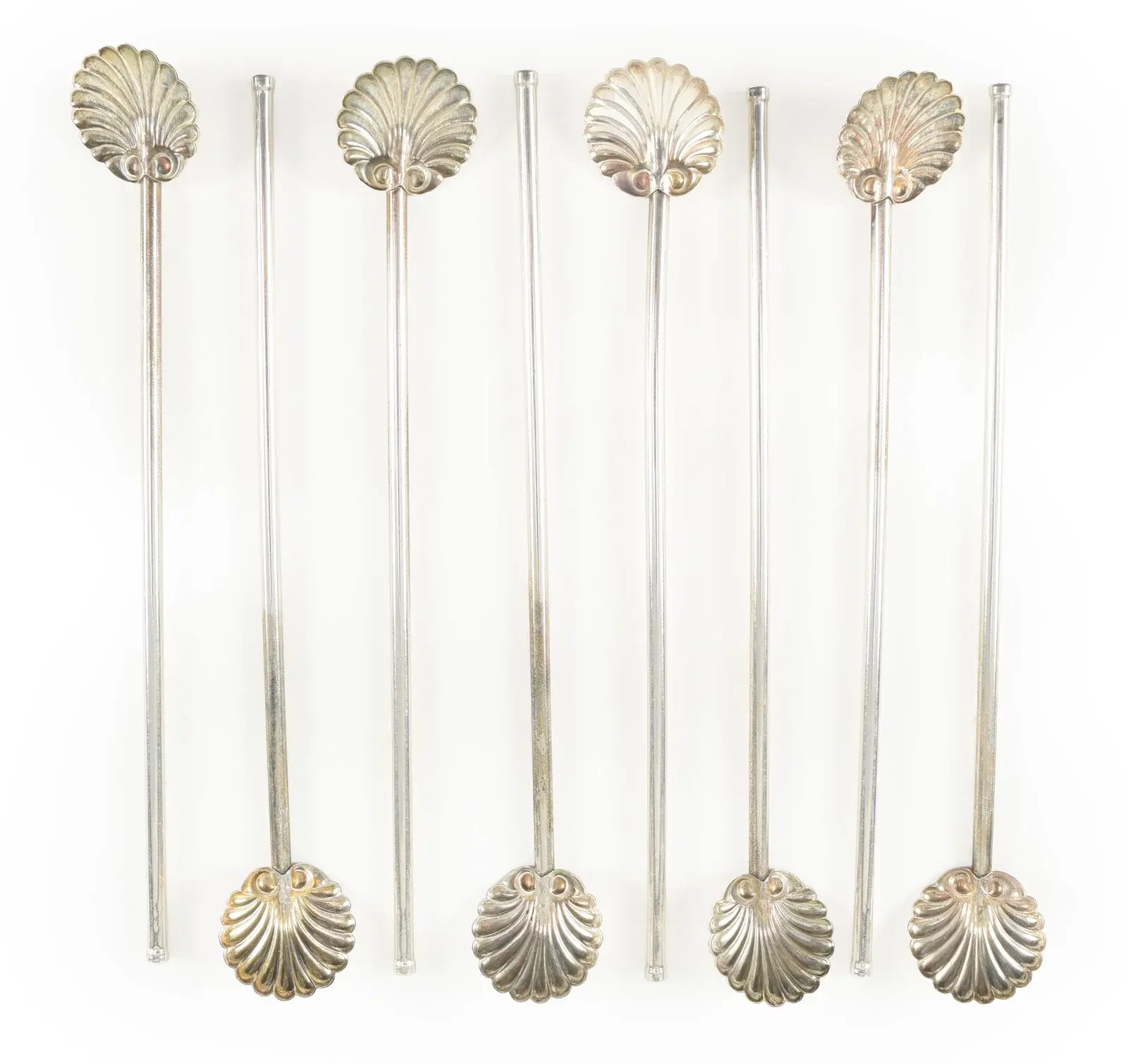 8 Sterling silver shell form sipper stirrers. Length 7.75 in. 2.57 ozt.
