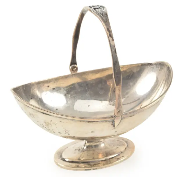 Arthur Stone sterling silver footed handled basket. Handle with reticulated