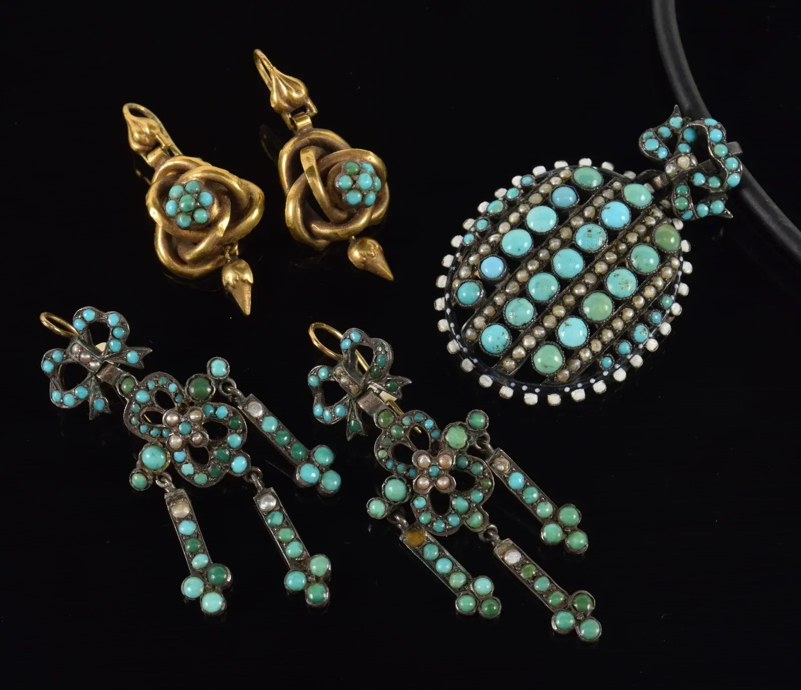 Antique gold and silver turquoise jewelry. 1) Pair of 10K gold knot