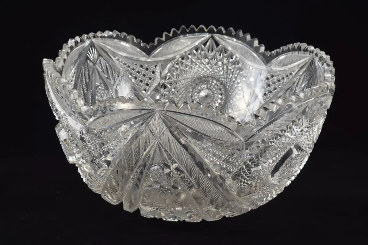 Large cut glass punch bowl with bold pinwheel decorations.. Diameter 14 in.