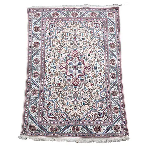 A Persian Silk and Wool Rug